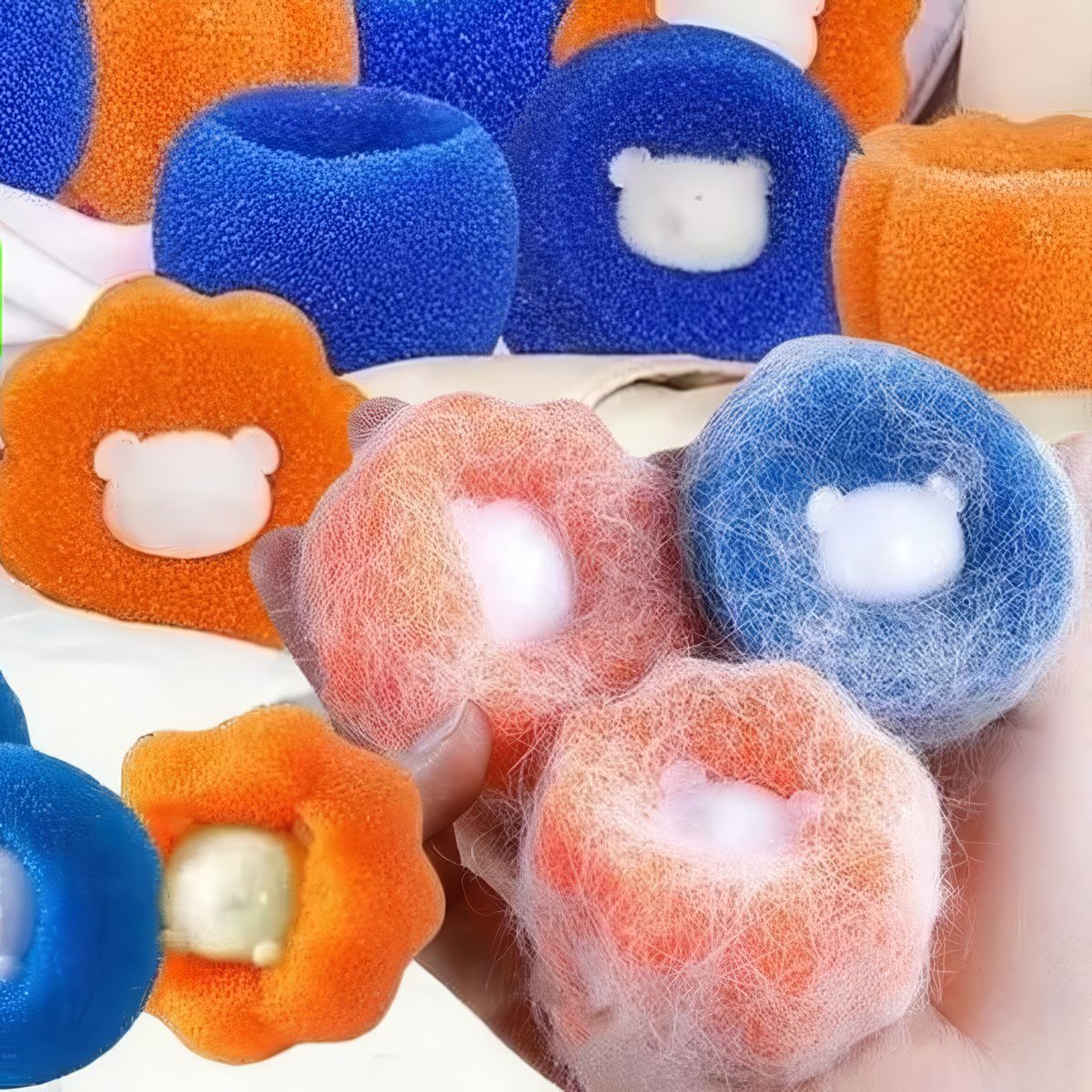 Pet hair remover balls covered in dog and cat hair they caught in the wash